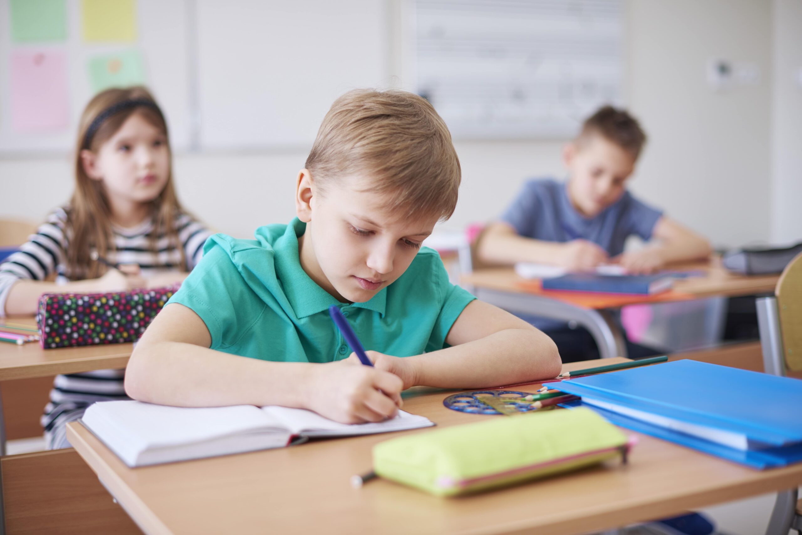 Classroom in a book. Школьник пишет в тетради. A schoolboy in class. Образование всем детям. Оплатить питание в школе.