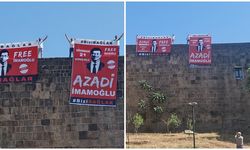 Diyarbakır'da surlara asılan 'İmamoğlu' pankartlarını polis indirdi