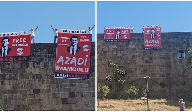 Diyarbakır'da surlara asılan 'İmamoğlu' pankartlarını polis indirdi